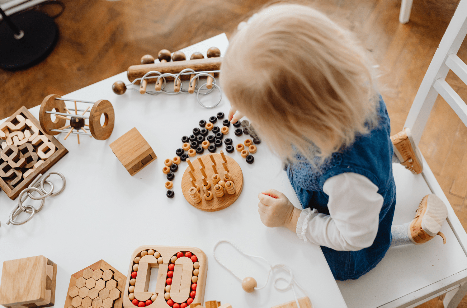 child playing with counting toys
